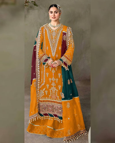 Mustard Color Bridal Wear Georgette Unstitched Pakistani Salwar Suits