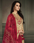 Beige Colored Partywear Embroidered Georgette Satin Anarkali Suit With Net Dupatta