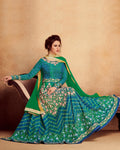 Teal Green and Blue Colored Partywear Embroidered Silk & Net Semi-Stitched Anarkali Suit