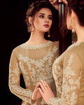 Beige Colored Partywear Embroidered Silk & Net Semi Stitched Anarkali Suit