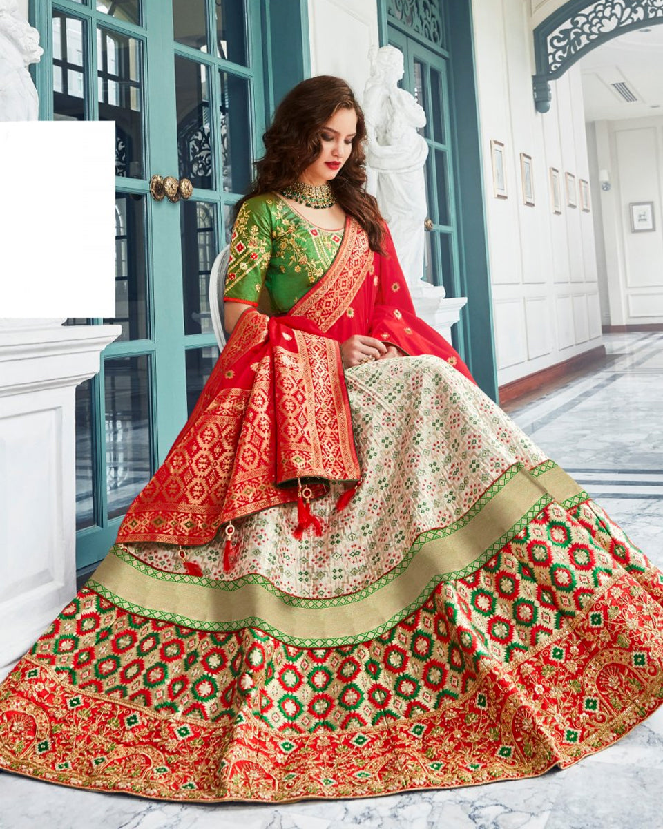 Red and green wedding on sale lehenga