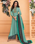 Fantastic Aqua Blue Colored Partywear Embroidered Muslin Palazzo Suit