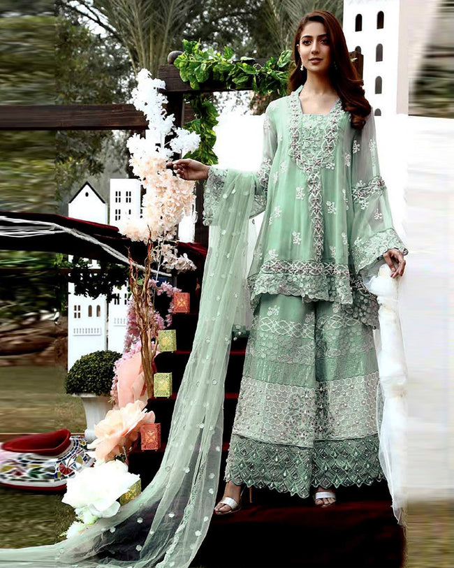 Light Green Colored Party Wear Unstitched Heavy Pakistani Salwar Kameez Suits