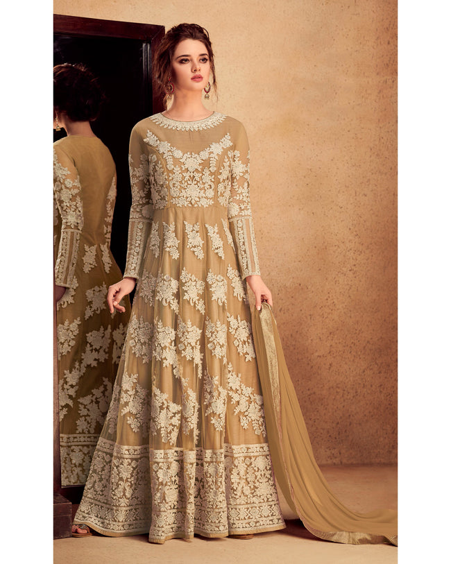 Beige Colored Partywear Embroidered Silk & Net Semi Stitched Anarkali Suit